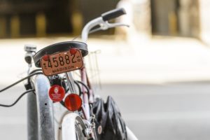 A bicycle with a novelty Madison license plate sits outside of the McBurney Disability Resource Center at the University of Wisconsin-Madison on Sept. 19, 2014. (Photo by Bryce Richter / UW-Madison)