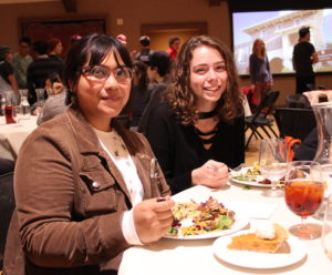 Two GreenHouse students dining