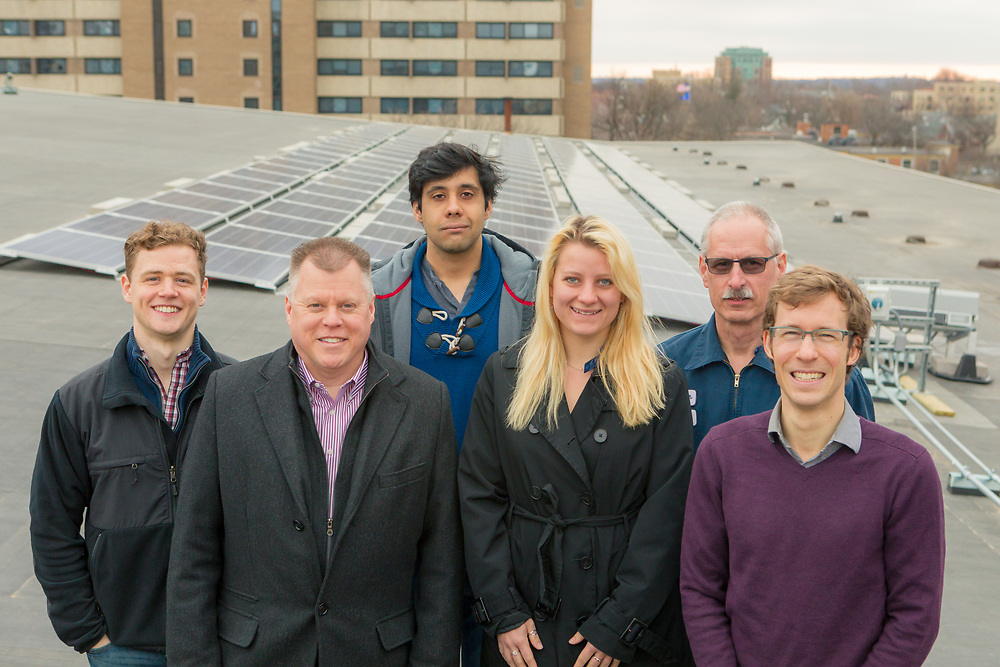 Members of Helios, Housing, Facilities Planning u0026 Management, and the Office of Sustainability gather on the roof of Gordon Dining u0026 Event Center. Left to right: Zach Galvin, David Darling, Sahil Verma, Breana Nehls, Stu Larose, Ian Aley.