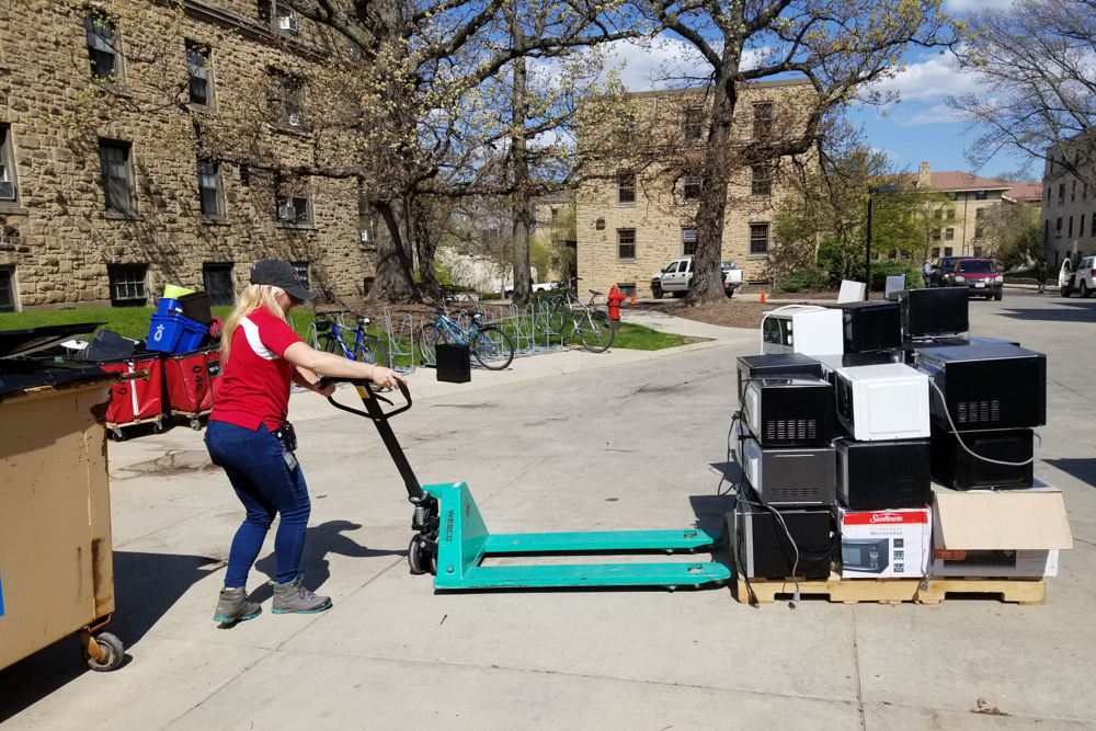 Breana Nehls moves microwaves during Move Out.