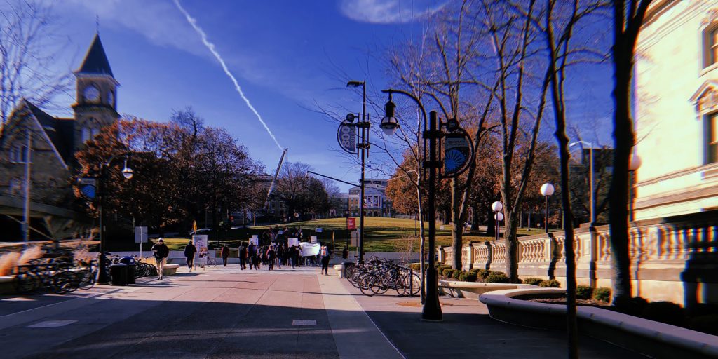 Students marching to Bascom Hill in order to stake their posters at the climate strike on Dec. 6, 2019. Photo by Norma Behrend-Martinez.