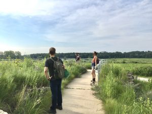 Students discuss Green Fund projects onsite with UW–Madison Arboretum staff.