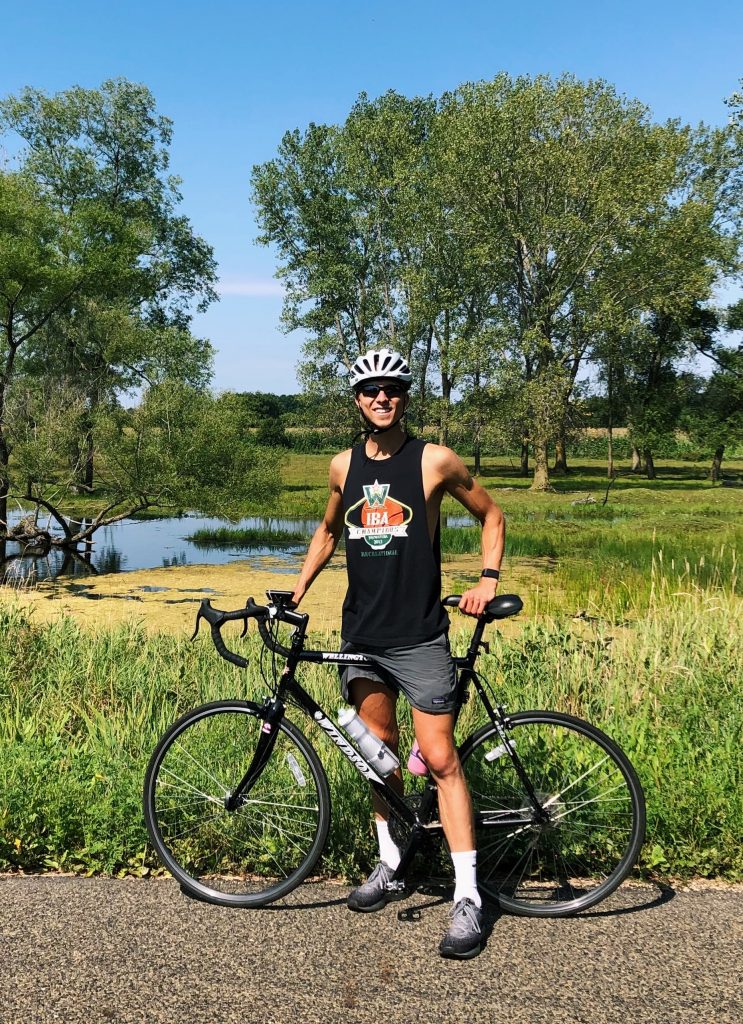 Former intern Nolan Billstrom on a bike