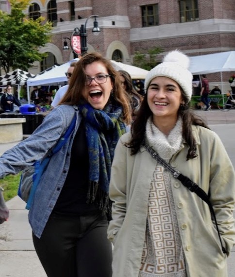 Smiling women standing together outside on the UW–Madison campus