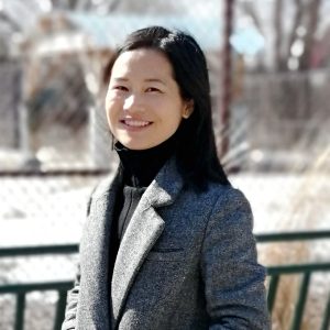 Headshot of Qunying Huang in front of a snowy background
