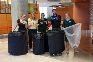 Student interns along with Tim Lindstrom and Audrey Stanton conducting a waste audit at the 2024 Sustainability Symposium