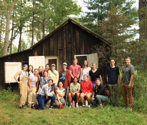 Student Interns standing in front of Aldo Leopold's shack