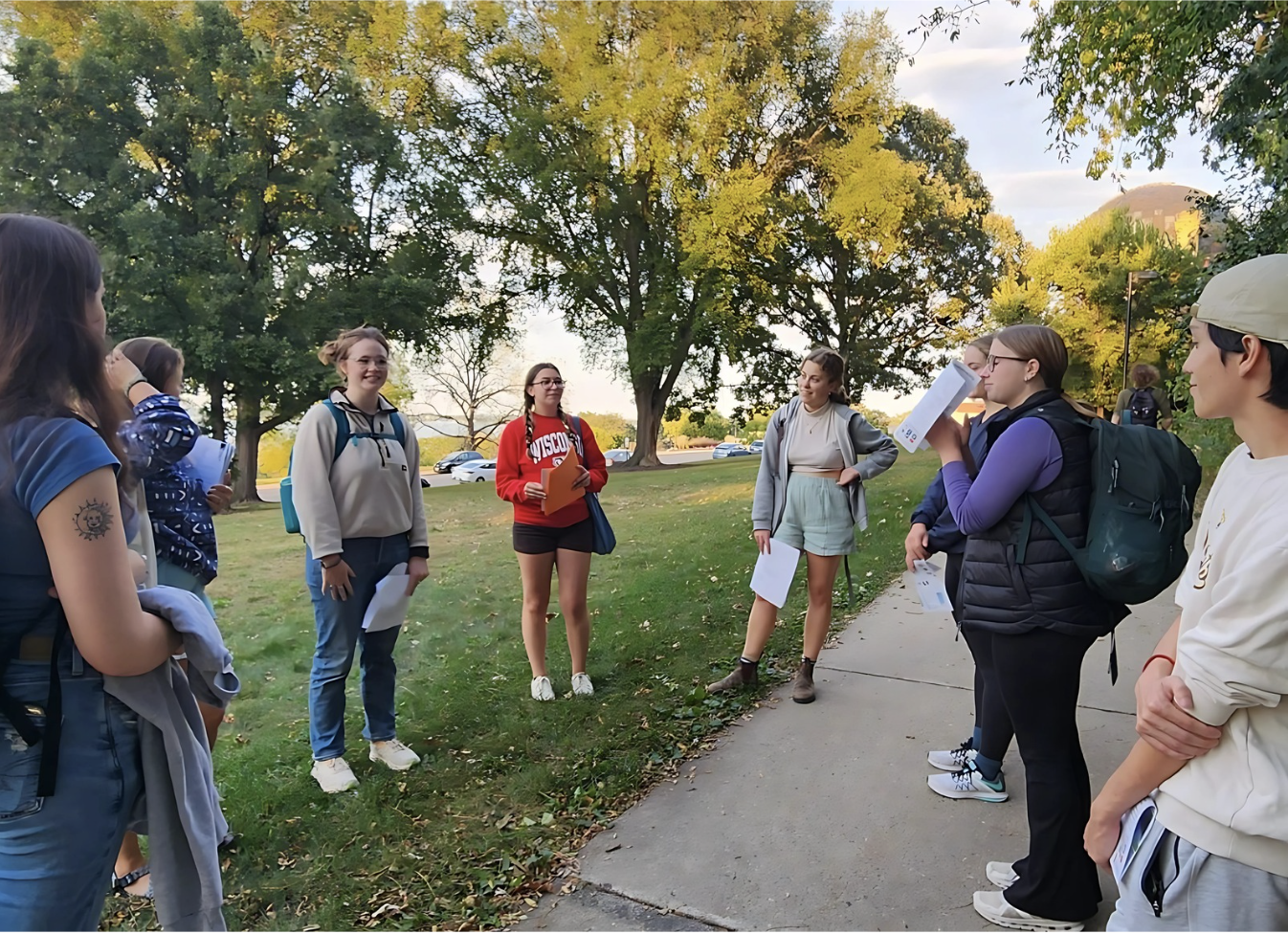 Students listen to the presenter on a tour