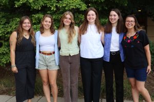 Group photo of Education and Outreach intern team 2024-25. From left to right stands Hannah Stahmann, Chandler Wells, Catie Stumpf, Lily Jenkins, Jordyn Czyzewski, Alicia Lopez.