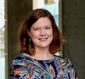 A professional photo of Dr. Erica Majumder