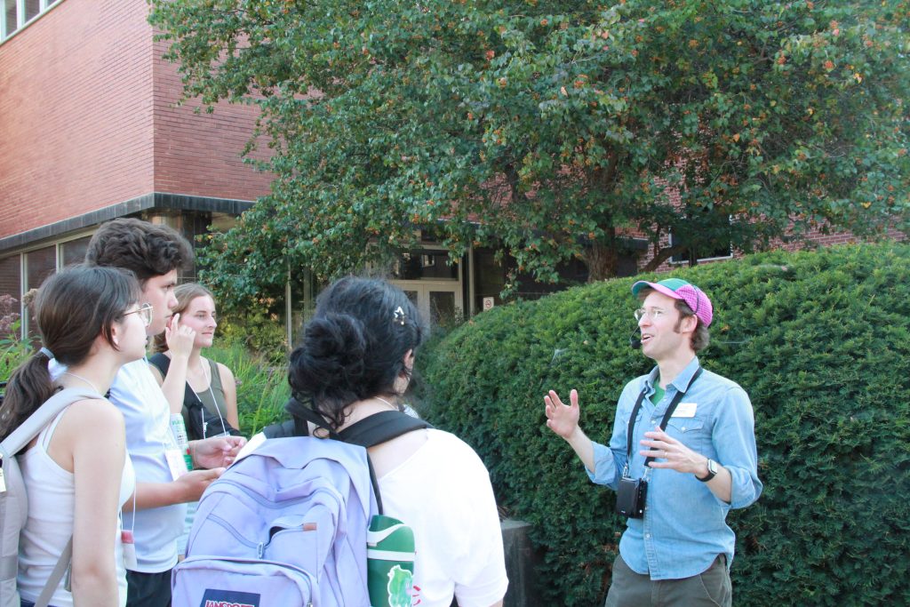 Aley speaking to a group of students.