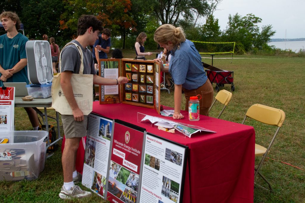 Student conversing at a table.
